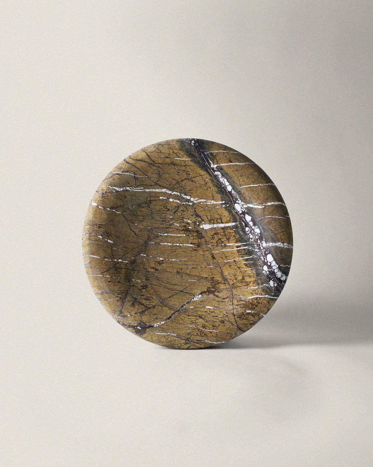 Brown marble decorative tray on a beige background