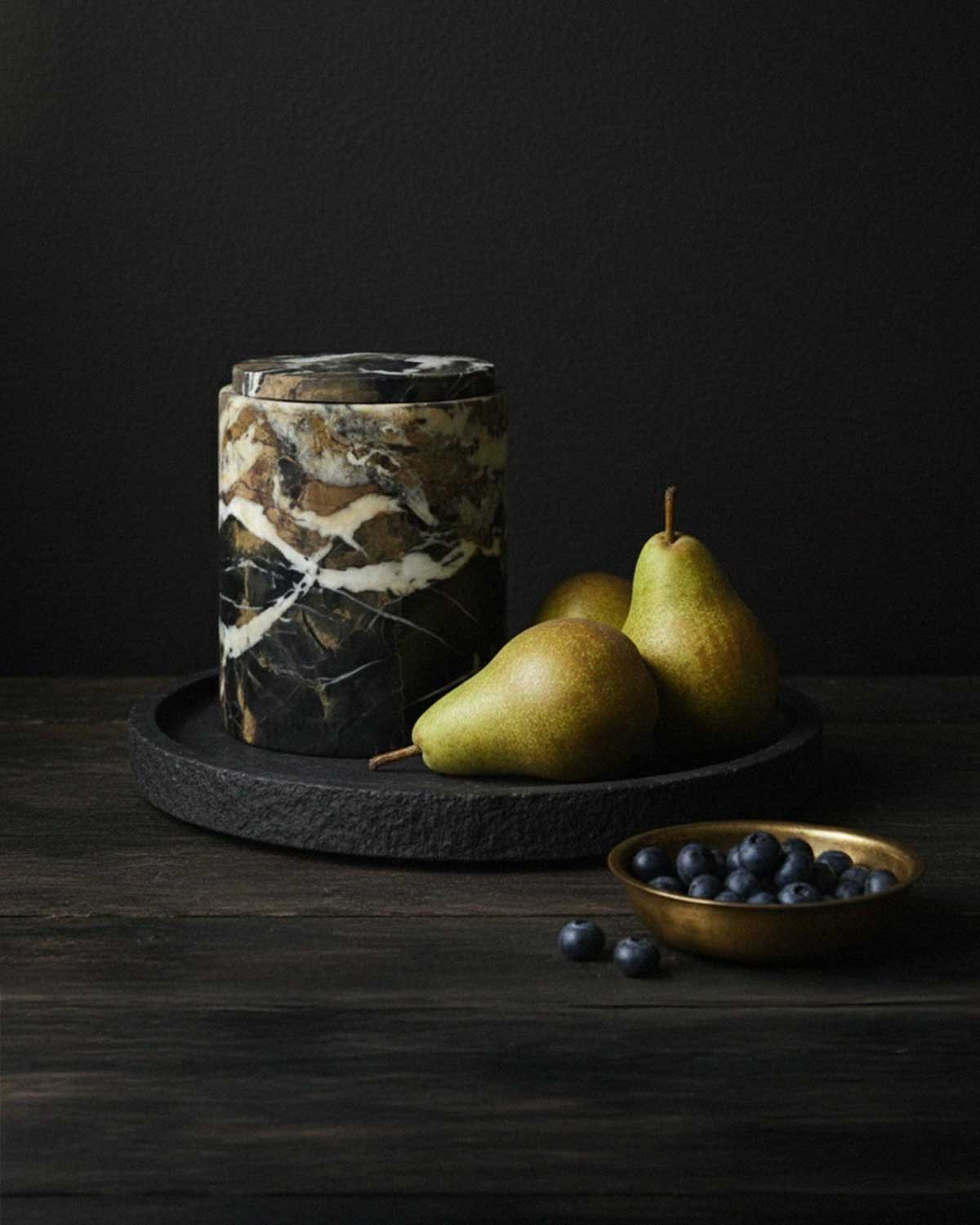 Nera Portoro Gold marble canister with lid on a black tray styled with pears by Morfí Design