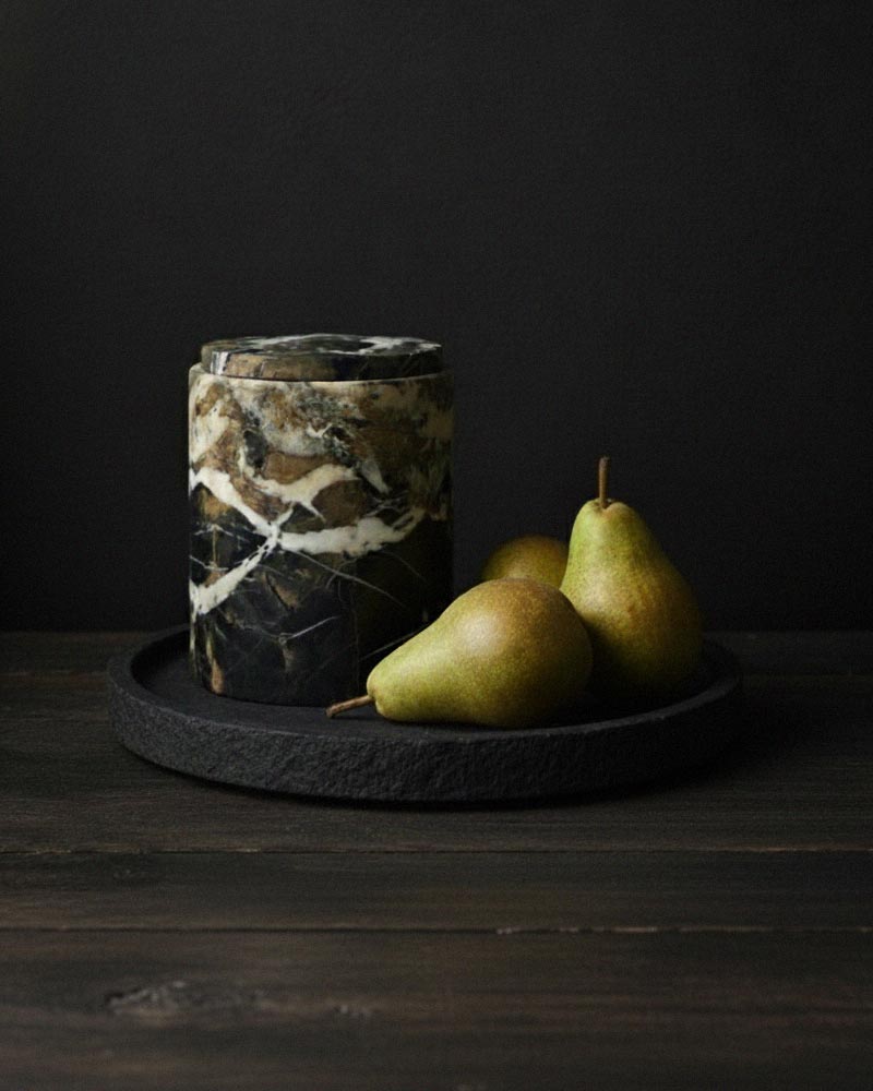 Nera Portoro Gold marble canister with lid on a black tray styled with pears.