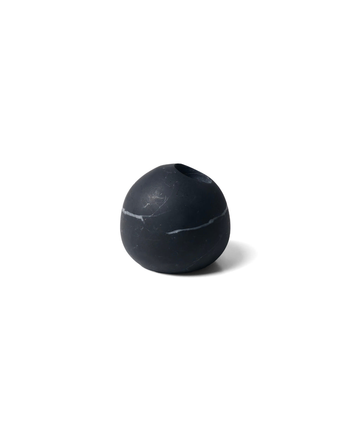 Sombra match stick holder made from Nero Marquina marble, front view