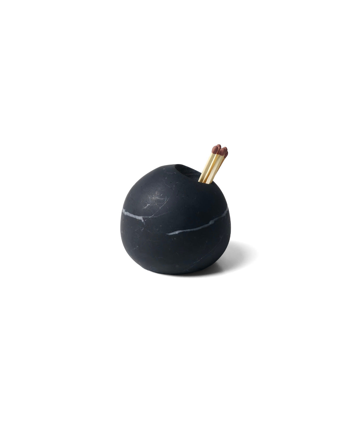 Sculptural black marble Sombra match holder with matchsticks inside