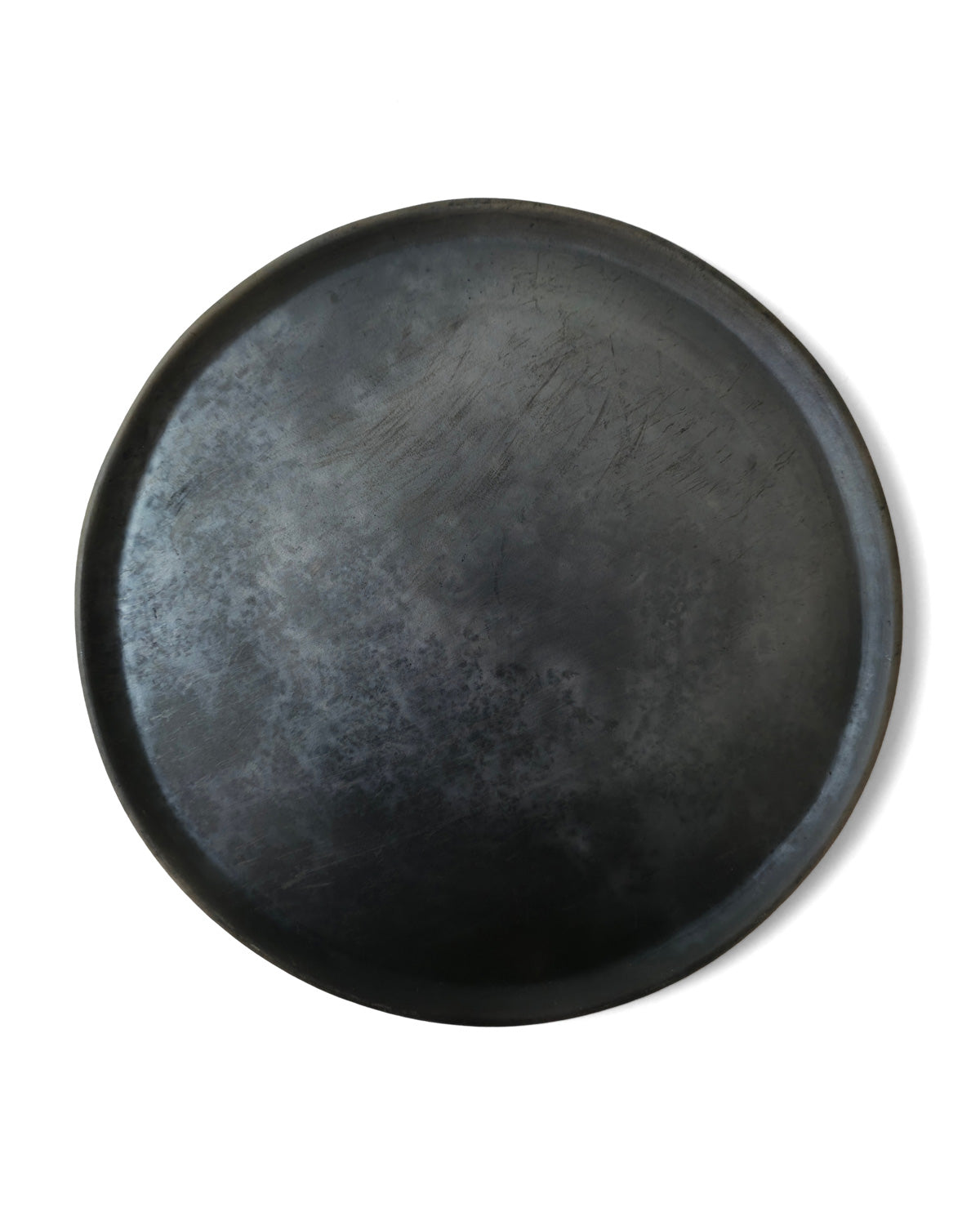 Top view of matte Oaxacan black clay serving platter.